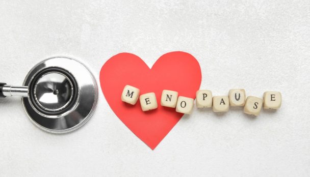 Word,Menopause,With,Paper,Heart,And,Stethoscope,On,White,Background